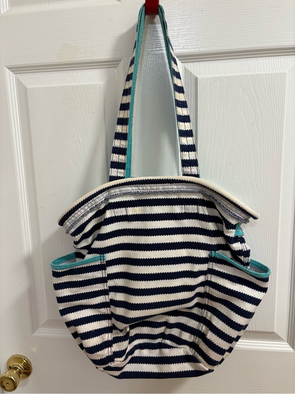 navy and white striped Thirty-One Retro Metro Canvas Tote Bag with teal straps